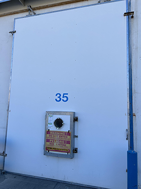 Entry port into the controlled atmosphere room where the Pace worker died. The port door is 36 inches tall by 24 inches wide, and 25 inches off the ground. The CA room, when it is oxygen deficient, is not designed for human occupancy. It is meant for prolonged fruit storage to prevent spoilage.